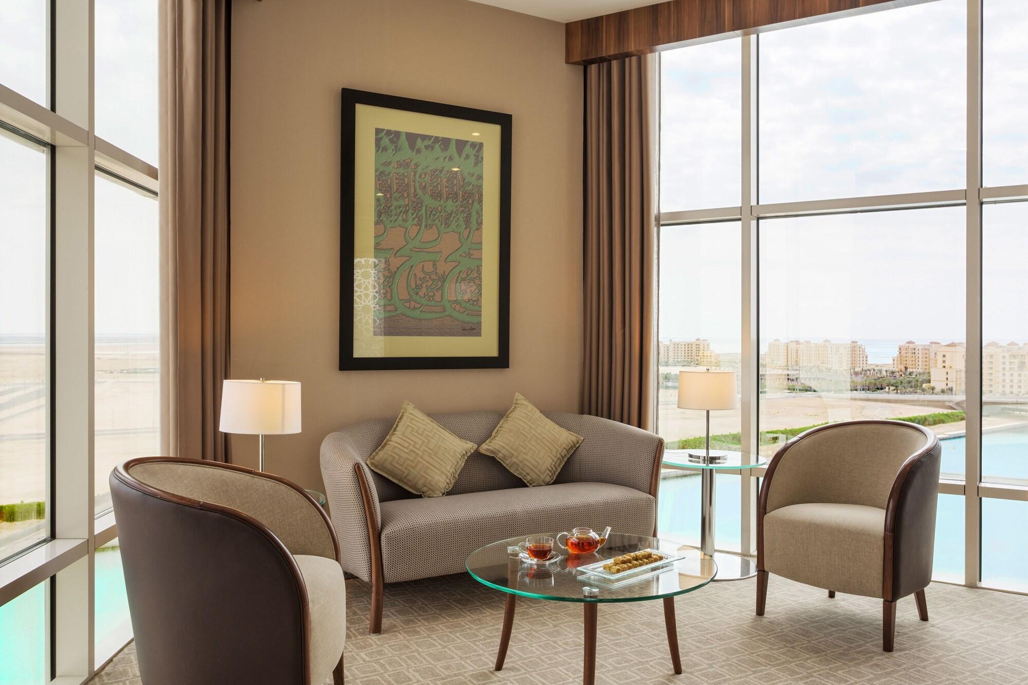 Bay La Sun Hotel And Marina - Emaar King Abdullah Economic City Екстериор снимка A living room in a suite at the hotel