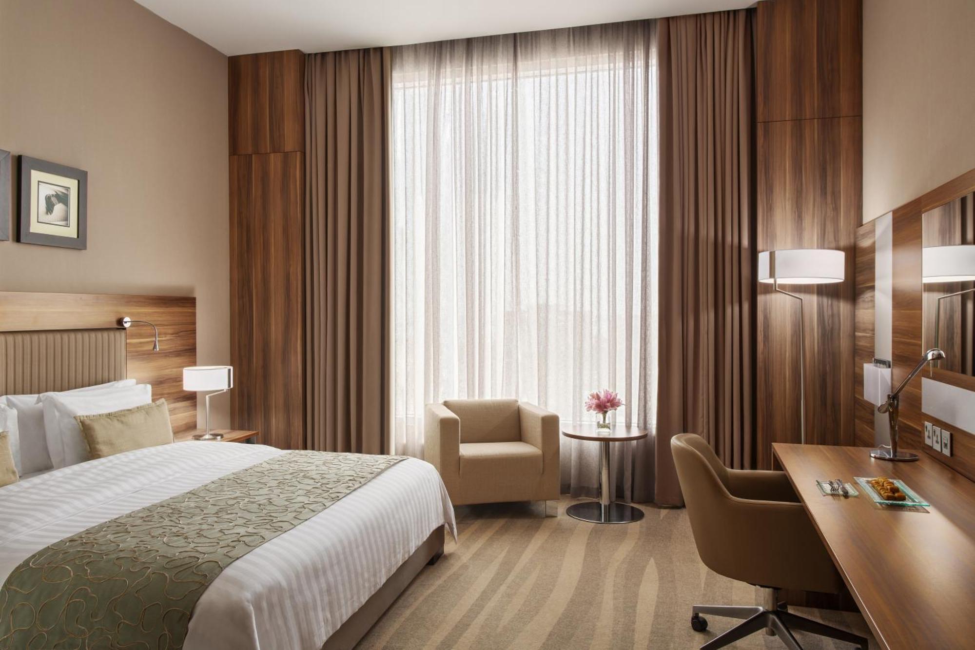 Bay La Sun Hotel And Marina - Emaar King Abdullah Economic City Екстериор снимка A room at the hotel